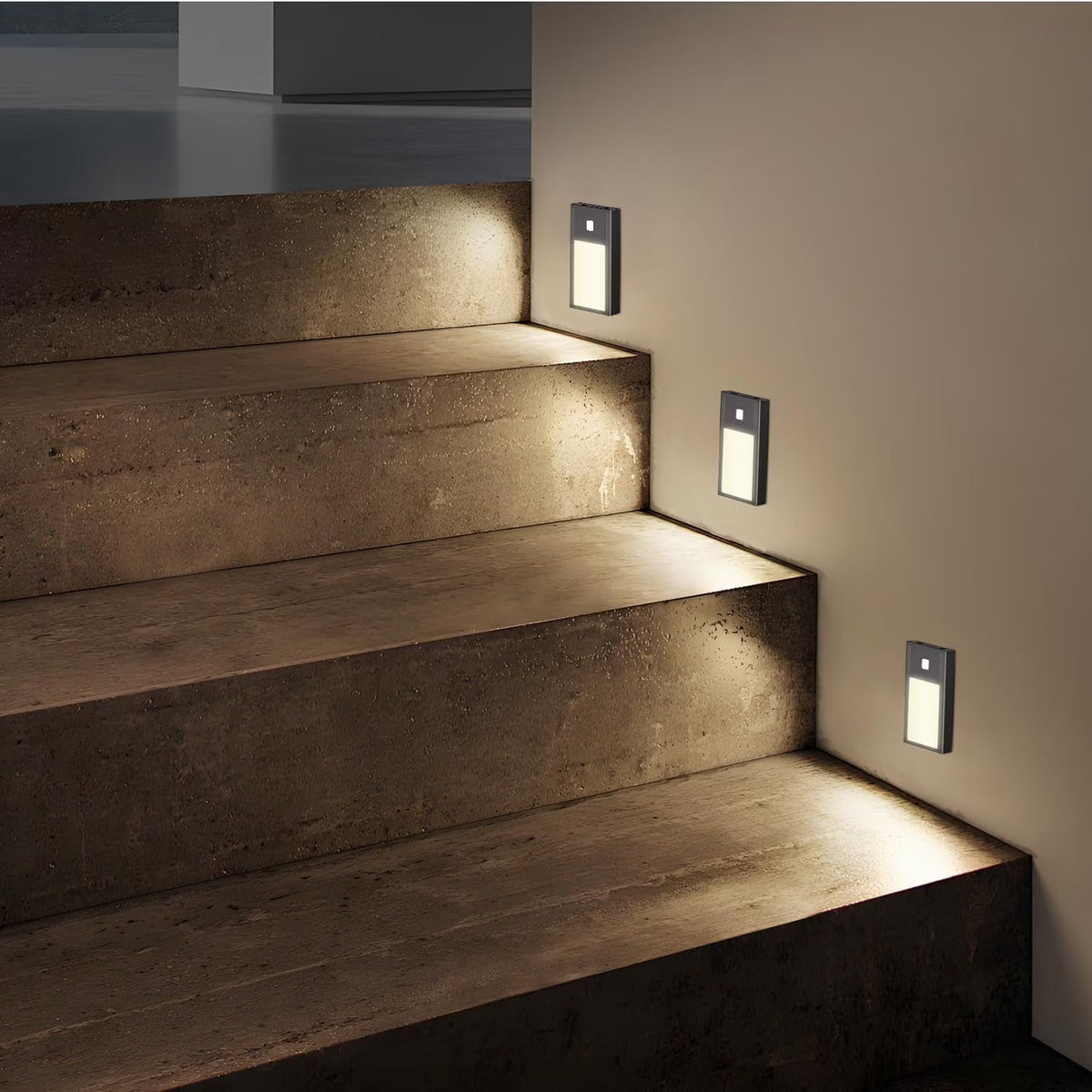 Motion sensor night light glowing softly in a modern hallway